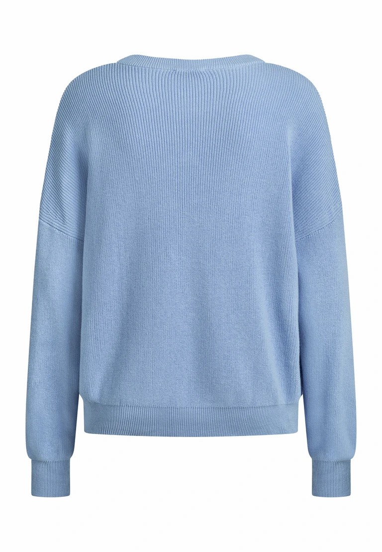 maglione a rotondo in lavorazione a maglia